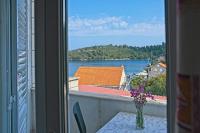 One-Bedroom Apartment with Balcony and Sea View