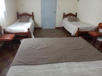 Camera Familiare con Bagno in Comune