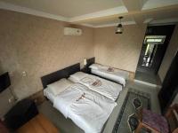 Chambre Triple avec Salle de Bains Privative