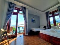 Standaard Tweepersoonskamer met 1 of 2 Bedden en Uitzicht op Zee