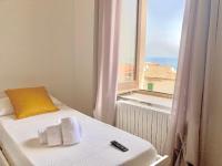 Deluxe Tweepersoonskamer met 2 Aparte Bedden en Uitzicht op Zee