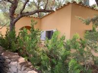 Casa Carmencita, immersa nel verde a pochi passi da mare - B&B Es Caló