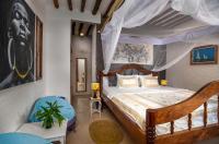 Kamer met Kingsize Bed en Uitzicht op Zee