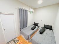 Tweepersoonskamer met 2 Aparte Bedden