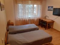 Tweepersoonskamer met 2 Aparte Bedden en een Extra Bed