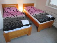 Tweepersoonskamer met 2 Aparte Bedden