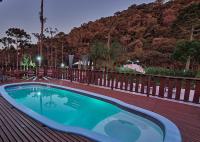 Suítes Pousada Jardim do Buda com café e piscina - B&B Urubici