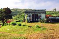 TINY HOUSE , frente al lago - B&B Calima