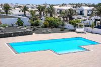 Luminosa vivienda vacacional con vista a la piscina - Chambres d'hôtes Costa Teguise