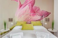 Zimmer mit Queensize-Bett und Gartenblick