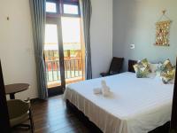 Tweepersoonskamer met Balkon en Uitzicht op Zee