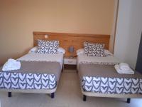 Tweepersoonskamer met 2 Aparte Bedden