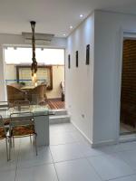 Apartamento com varanda Gourmet na praia da enseada - Bed and Breakfast Guarujá