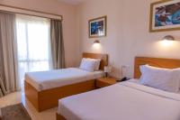 Deluxe Δίκλινο Δωμάτιο - με 2 μονά κρεβάτια - με θέα στην Πισίνα