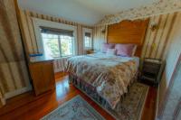 Zimmer mit Queensize-Bett und Meerblick