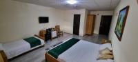 Chambre Deluxe Double ou Lits Jumeaux