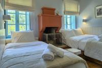 Camera Tripla con Camino e Vista Montagna