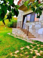 Camera Familiare con Vista Giardino