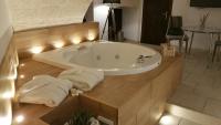 Suite met Queensize Bed en Bubbelbad