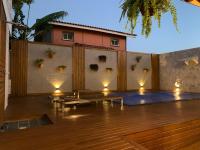 Casa com piscina em frente à Praia do Santinho - Chambres d'hôtes Florianópolis