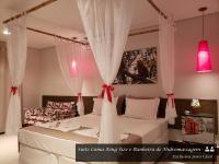 Suite mit Kingsize-Bett mit Whirlpool