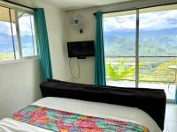 Chambre Lit Queen-Size Deluxe