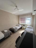 Dreibettzimmer mit Gemeinschaftsbad