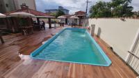 Apartamento aconchegante com piscina - Praia Grande - Chambres d’hôtes Ubatuba