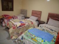 Chambre Triple – Vue sur Montagne