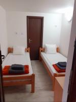 Tweepersoonskamer met 2 Aparte Bedden