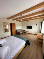 Kamer met Kingsize Bed en Uitzicht op de Bergen