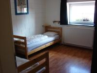 Camera Doppia con Letti Singoli e Bagno in Comune