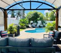 B&B Pompano Beach - New! Tropical Escape in Pompano with private heated Pool, Spa, and Covered Pergola - Bed and Breakfast Pompano Beach