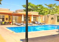 Unified Vacation Homes-Spacious Studio in lush green Motor City - B&B Dubai