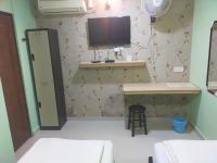 Camera Doppia con Letti Singoli e Bagno in Comune