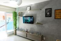 Apê aconchegante condomínio beira lagoa c/piscina - Ferienwohnung Arraial do Cabo