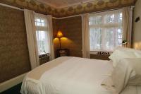 Kamer met Queensize Bed en Uitzicht op de Oceaan met Aparte Badkamer
