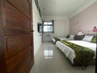 Kamer met 2 Kingsize Bedden
