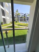 Departamento en planta baja, frente a la alberca y terraza, aire acondicionado total y WIFI - Chambres d'hôtes Manzanillo