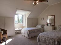 Zweibettzimmer mit Gartenblick