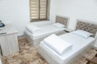 Tweepersoonskamer met 2 Aparte Bedden