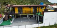 Pousada Container Amarelo - B&B Palhoça
