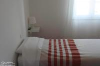 Kleines Doppel-/Zweibettzimmer mit Gemeinschaftsbad