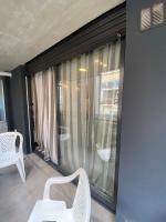 Monoambiente moderno con balcón al frente - Zona Río - Chambres d’hôtes Rosario