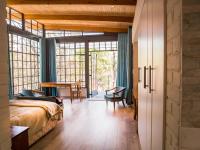 Luxe Kamer met 1 of 2 Bedden en Uitzicht op de Rivier