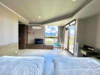 Deluxe Kamer met 2 Queensize Bedden