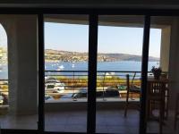 Seafront apartment at Waters' Edge - Chambres d’hôtes San Pawl il-Bahar