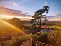 B&B Axminster - Our beautiful large Suite room with a Double bath with Shower ensuite - It has a full Kitchen boasting stunning views over the Axe Valley - Only 3 miles from Lyme Regis, River Cottage HQ & Charmouth - Comes with free private parking - Bed and Breakfast Axminster