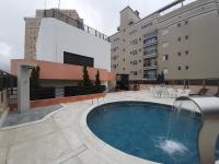 Lindo Flat no Edifício Cosmopolitan, com GARAGEM e PISCINA - B&B Santos