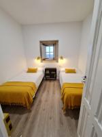 Habitación Doble con baño privado externo - 2 camas